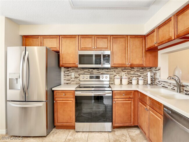 Photo - 6670 Huntington Lakes Cir Unit 104