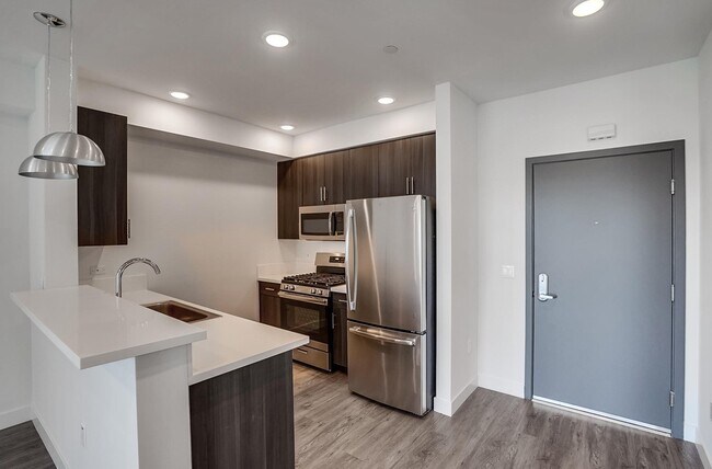 Photo - 6015 Woodman Ave Apartments