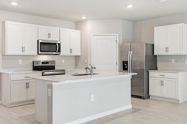 "Spacious 4-Bedroom Gem with 2 Full Baths in Charming Punta Gorda Oasis!"