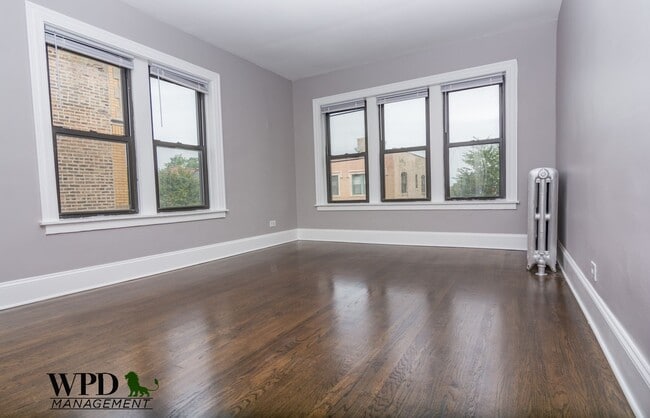 Building Photo - 1506 W 80th St Unit 1