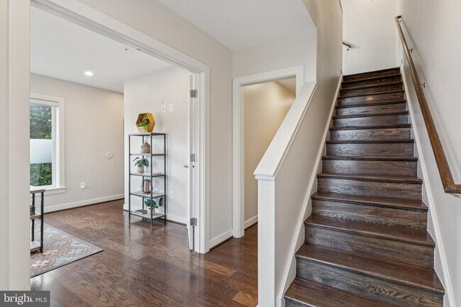 Photo - Perfectly located just steps from the Red Line Metro, this EYA-built Davis Model townhome at West...