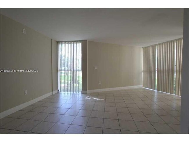 Building Photo - 7165 NW 186th St Unit A107