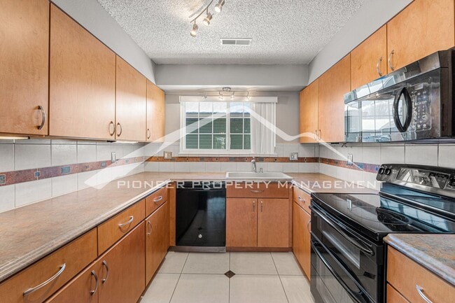Photo - Fantastic Townhome with 1-Car Attached Garage, and Central AC!