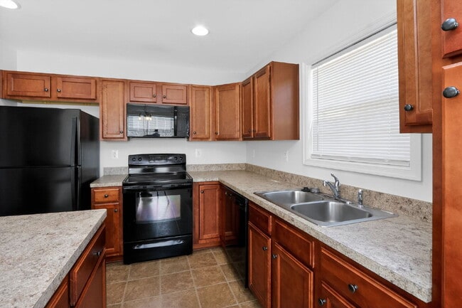 Photo - Welcome to a gorgeous end unit townhouse, located in the Heather Hills community.