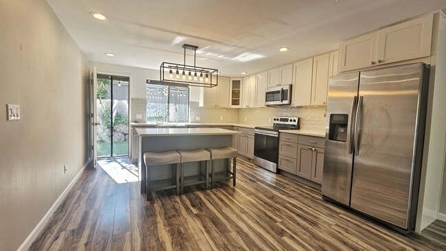 Photo - Modern Bellevue Townhome | Chef’s Kitchen, Dual Fireplaces & Private Patio