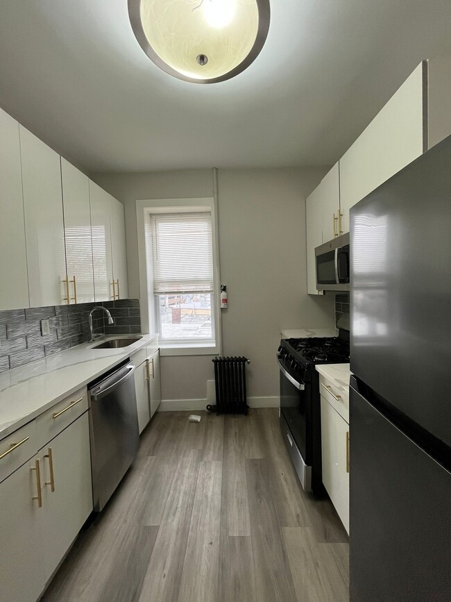 Building Photo - 5809 Palisade Ave Unit 14