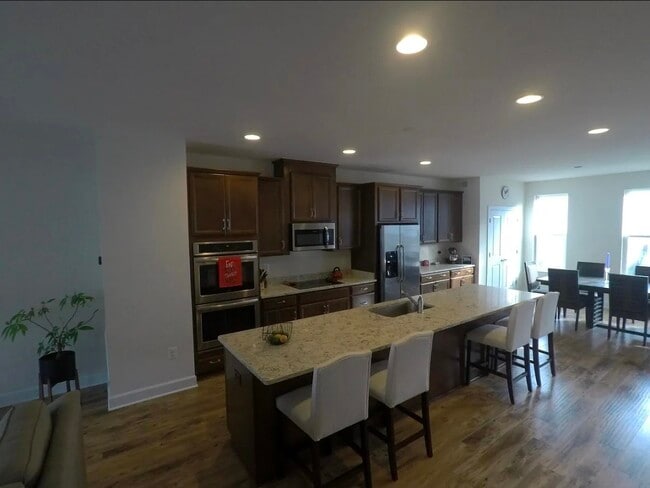 Kitchen, front angle - 8828 Englewood Farms Dr