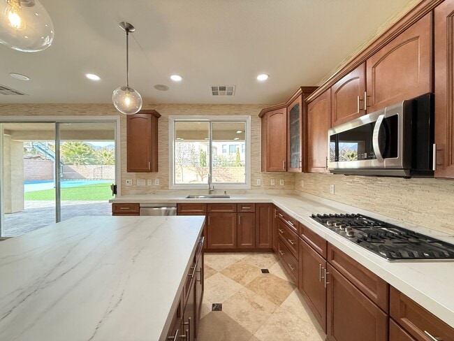 Photo - COMING SOON!  Gated 4BD/3BA home near Red Rock Casino! Sits on a huge corner lot!