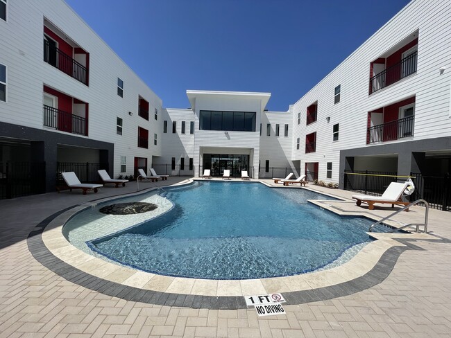 Sparkling Swimming Pool Oasis - Monarch Apartments