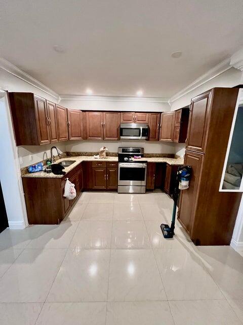 Building Photo - 340 W Blue Heron Blvd Unit A