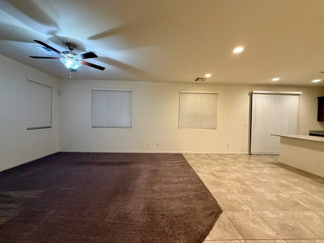 Photo - Beautiful 2260sqft 3bed 2.5bath with tile downstairs, carpet in Den & Living Room