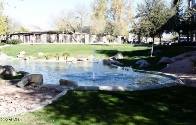 Building Photo - 5345 E Van Buren St Unit 238