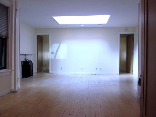Living/Dining with Working Fireplace and Large Skylight - 127 West 56th Street Unit Apt 5