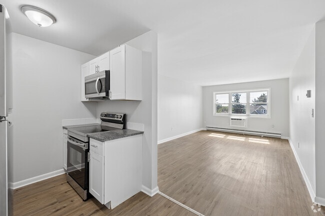 1BR, 1BA - 714SF - Kitchen and Living Room - Blackrock Homes Apartments