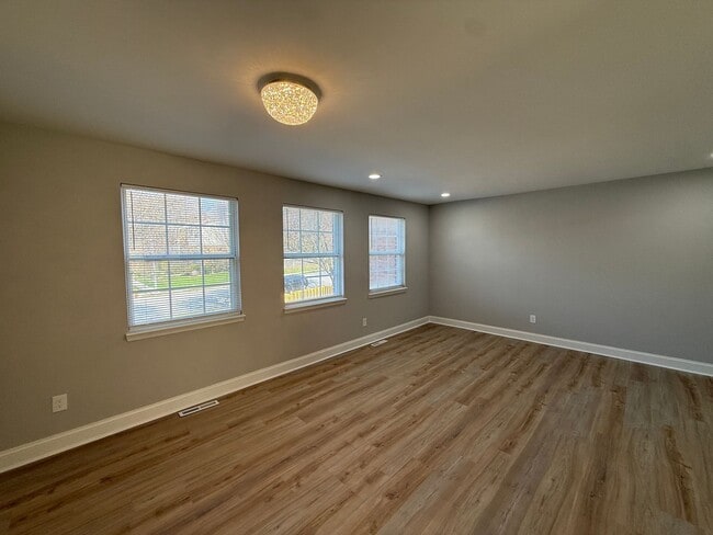 Photo - New Everything 4BR Townhome with Private Lower Level Suite | Stainless Kitchen | LVP + New Carpet...