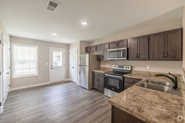 2BR, 2.5BA - 1,075SF - Kitchen - Professional Park Dr - 931