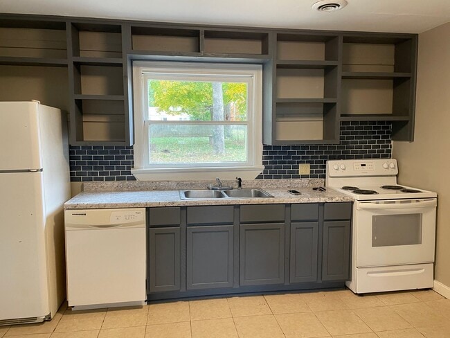 Photo - New kitchen!  3 beds, 1 bath large fenced yard