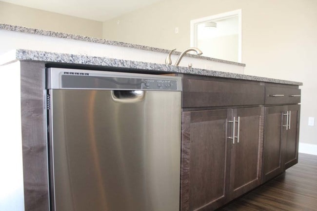 breakfast nook with full sink and dish washer