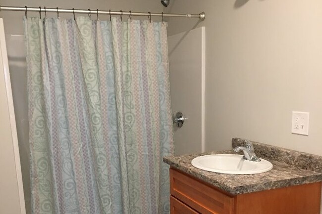 bathroom with 220 w/d hookup - 10 Ashland St Apartment Unit 12-2