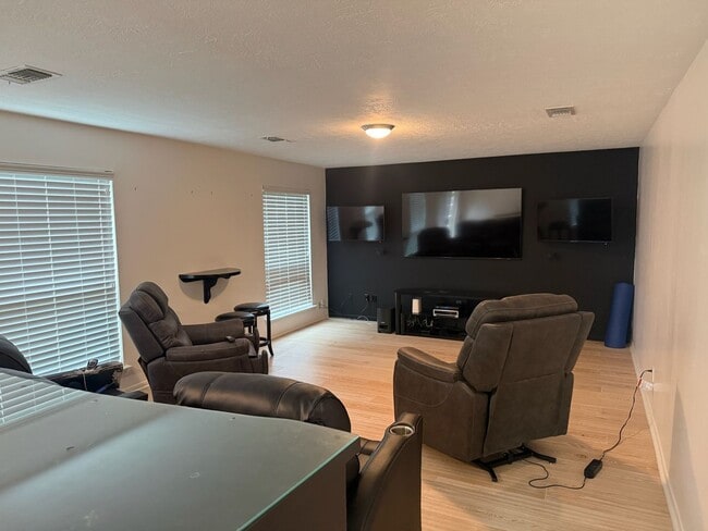 Photo - Beautiful 4-Bedroom Spring Home with Updated Primary Bath & Covered Patio