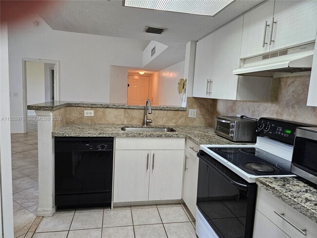 Photo - 5011 Wiles Rd Unit 306