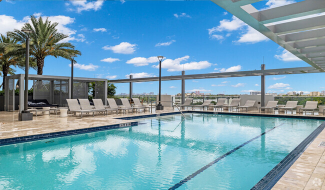 Take a dip at your rooftop pool with beautiful views - The District at Flagler Village Rental