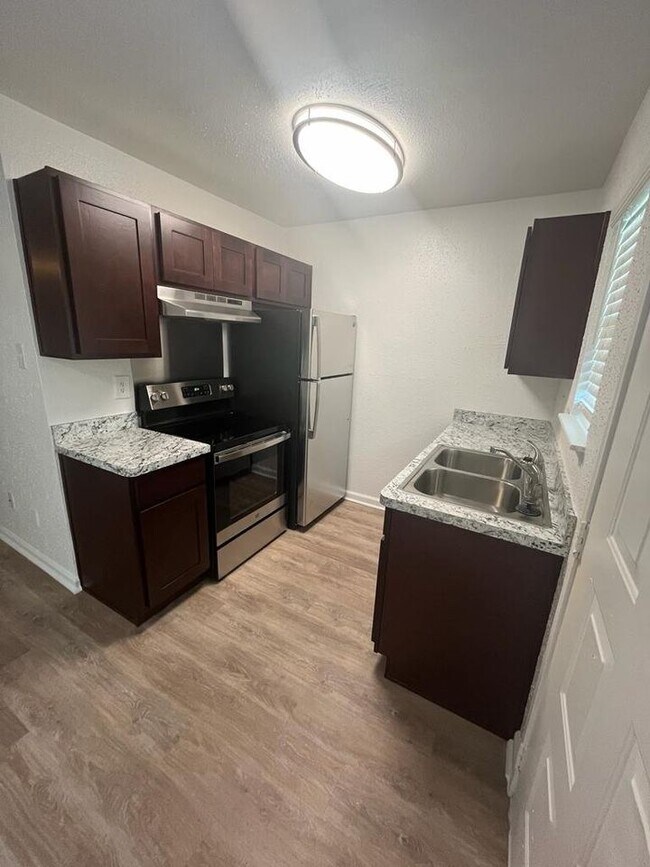 Photo - Tall Timbers Apartments