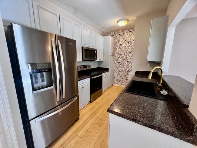 Photo - Beautifully Remodeled Corner Condo with Dual Primary Suites in The Villas at Bellamy