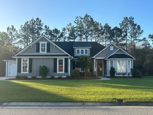 Building Photo - Spacious 4BR/3BA Creekside West Home with Screened Porch, Fenced Yard & 3-Car Garage