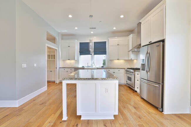 Photo - Modern 3-Bedroom Townhome with Rooftop Dec...