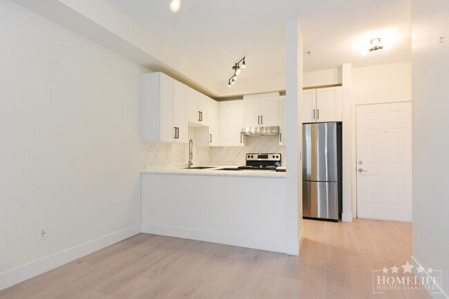 Photo - Bright & Updated 1-Bedroom Condo in the Heart of Surrey City Centre Unit 213