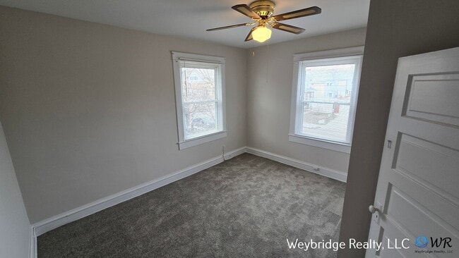 Photo - Charming 3BR Home in Norwood with Fenced Yard, Detached Garage & Workshop – Prime Location!