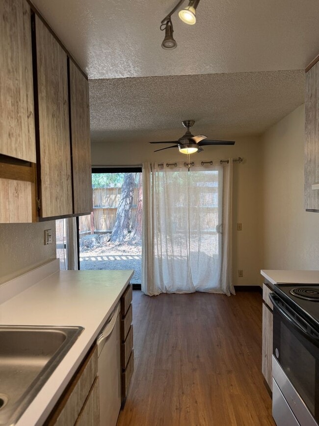 Photo - Spacious 2 Bed, 1.5 Bath Condo w/Carport - Outdoor Pool in Summer (Long Term Rental)