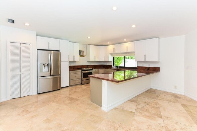 Photo - Northeast 26th Street, Boca Raton, FL 33431 - 3 BR 2 BA single-family home