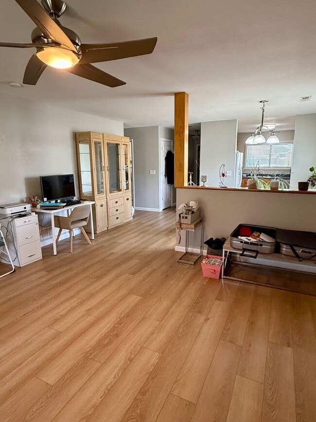 Photo - Updated 3BR Home with Laminate Flooring Throughout & Spacious Yard