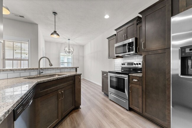 Photo - NEW LUXURY 3 BED 2 BATH 2 CAR GARAGE DUPLEX