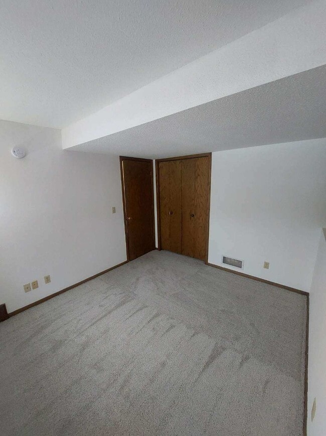 Bedroom - Unit 2 - 5340 Russell Ave N Apartments Unit 2