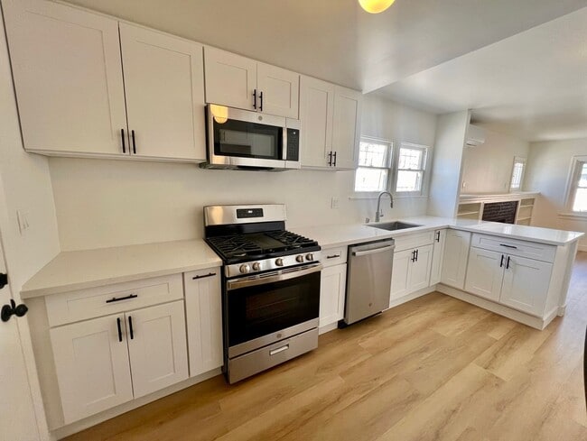Building Photo - 3007 Dalton Ave Unit 3007 1/2 Dalton Ave.
