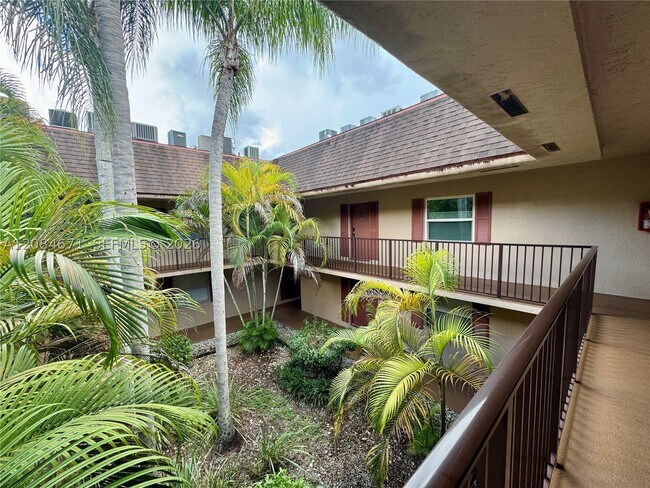 Building Photo - 11259 SW 88th St Unit 204H