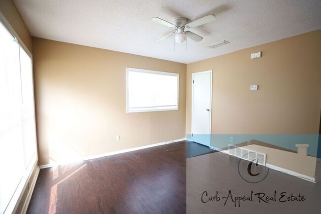 Photo - This 2 bedroom 1 bath apartment - includes refrigerator, stove and dishwasher.