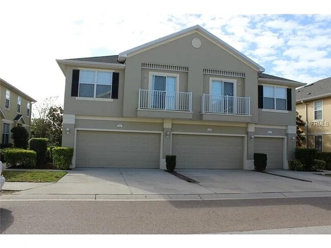 Photo - 6841 Breezy Palm Dr Townhome