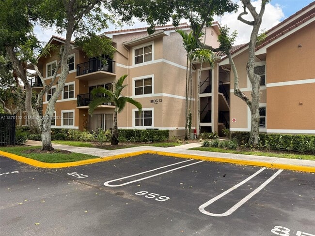 Building Photo - 8781 Wiles Rd Unit 108 Rental