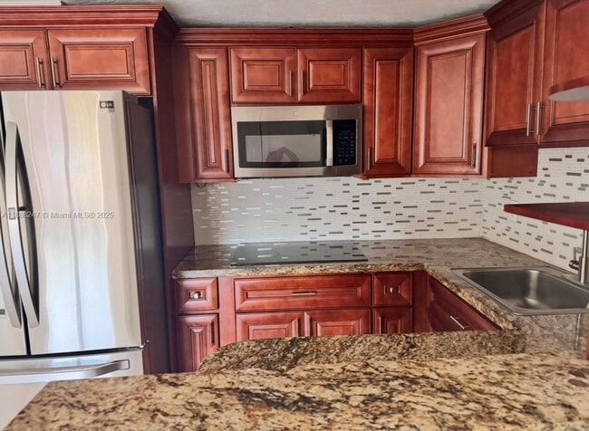Building Photo - 606 W 81st St Unit 303