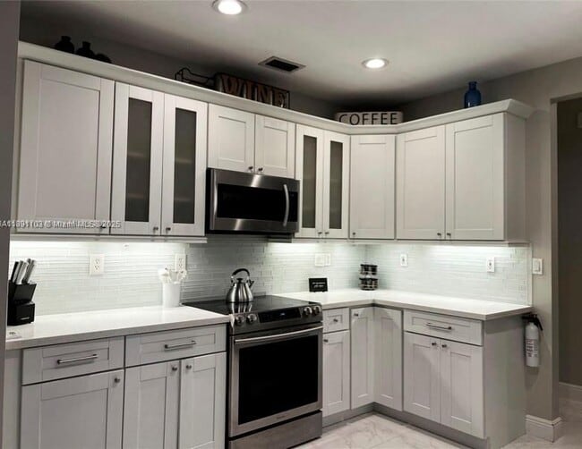 Photo - 12591 NW 57th Pl Unidad TOWNHOUSE