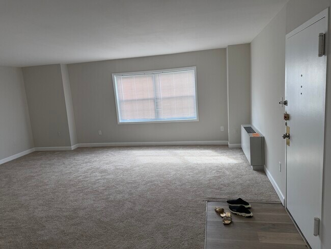 living room - 4421 Romlon St Unit 104 Alex Conteh