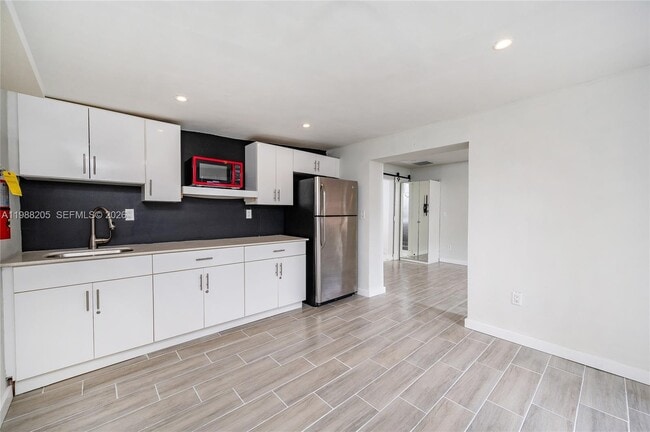 Building Photo - 10954 SW 157th Terrace Unit 1