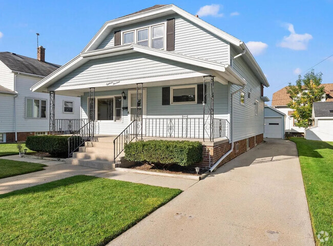 Exterior. Long driveway that leads to garage. - 1814 S 15th St Rental