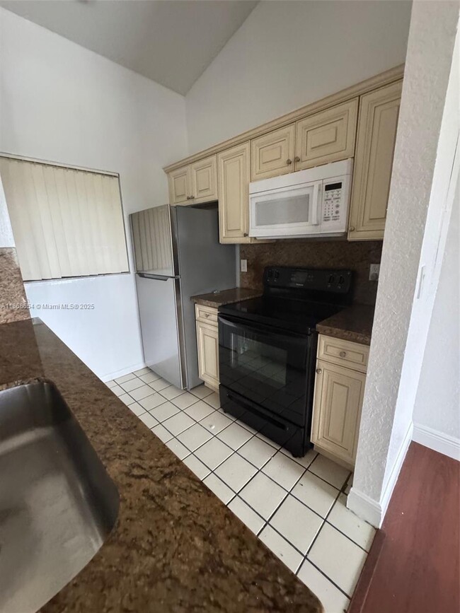 Photo - 2881 N Oakland Forest Dr Unit 310