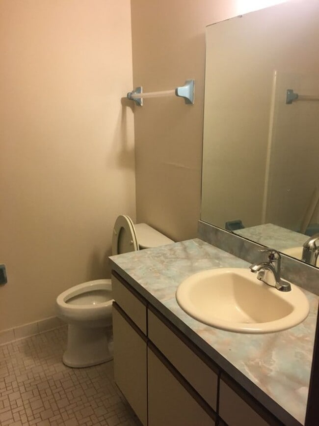 Photo - Welcome to this inviting 4-bedroom, 2-bathroom home.