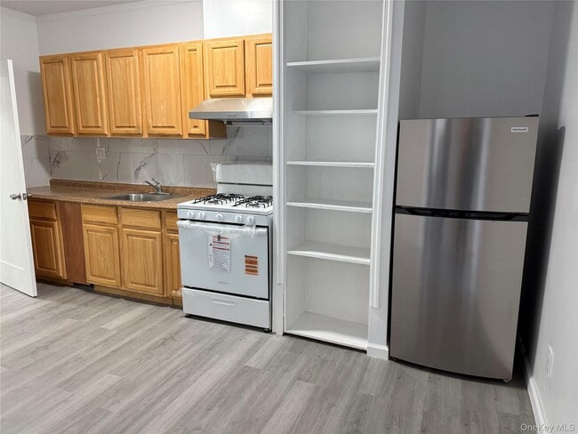 Building Photo - 1964-64 81st St Unit 1FL